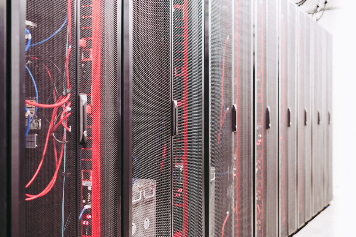 Well-lit server facility with organized network cabling